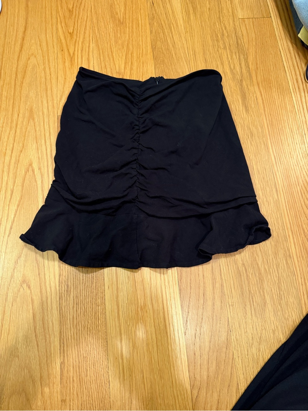 Katie J NYC Black Ruched Mini Skirt with Ruffle Hem